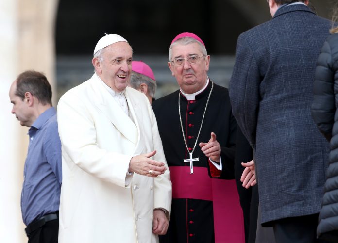 Pope Francis and Archbishop of Dublin Diarmuid Martin attend the Wednesday general audience in Saint Peter's square at the Vatican