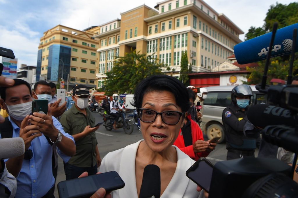 Cambodian-American human rights advocate Theary Seng speaks to the media before a hearing at Phnom Penh municipal court in Phnom Penh on Nov. 26, 2020, during a mass trial against more than 100 opposition members and activists charged with conspiracy to commit treason related to self-exiled opposition figurehead Sam Rainsy’s failed plan return to the country in 2019. (Photo by Tang Chhin Sothy/AFP)