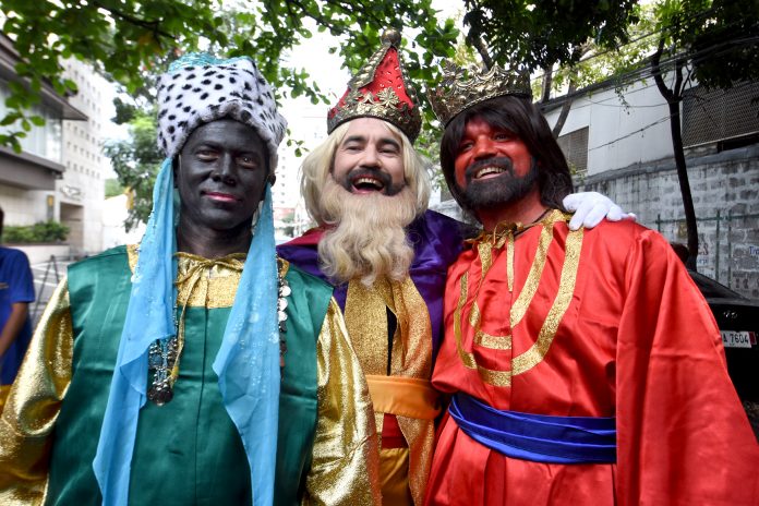 Actors dressed as the ‘Three Wise Men’ pose for a photograph in Manila in 2017. (File photo by Angie de Silva)