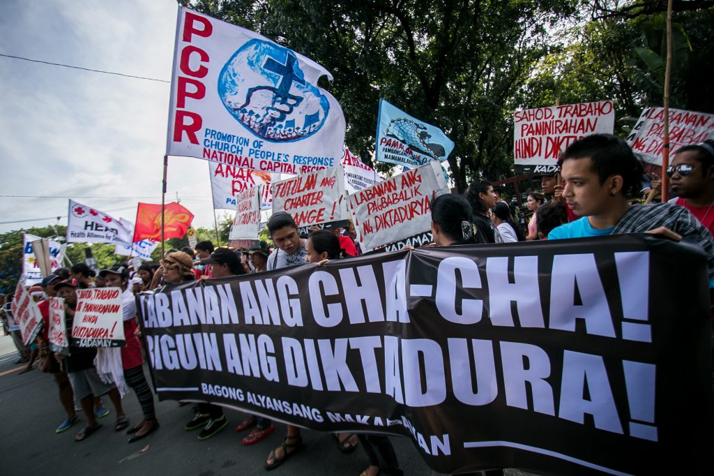 Church and activist groups stage a demonstratio in January 2018 against moves to revise the Philippine Constitution. (File photo by Mark Saludes)