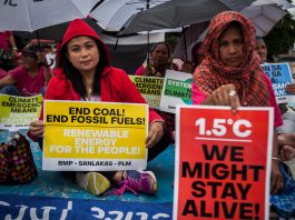 Pro-environment activists hold a demonstration calling for an end to the use of dirty energy in Manila in this photo taken in 2019. (File photo by Mark Saludes)