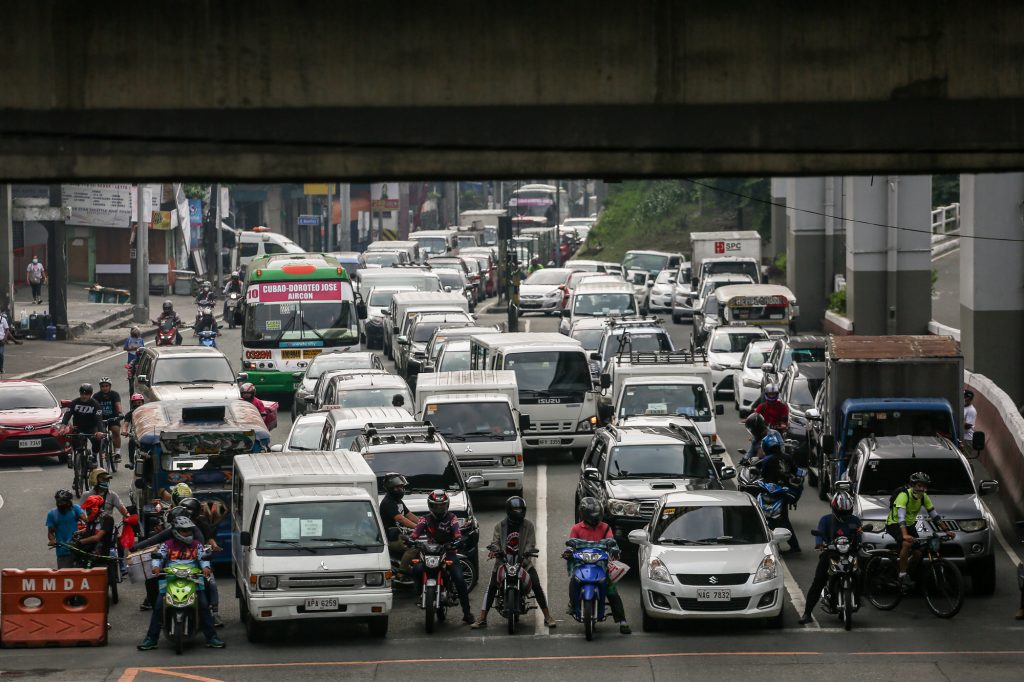 Heavy traffic is back in the Philippine capital as health restrictions continue to ease despite the reported growing number of COVID-19 cases in the country. (Photo by Basilio Sepe)