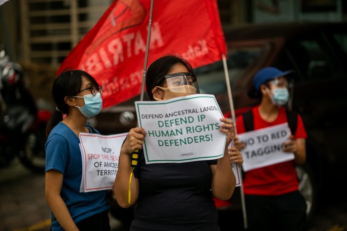 Activists call for respect for human rights and for an end to attacks on activists during a demonstration in Manila in 2020. (File photo by Mark Saludes)