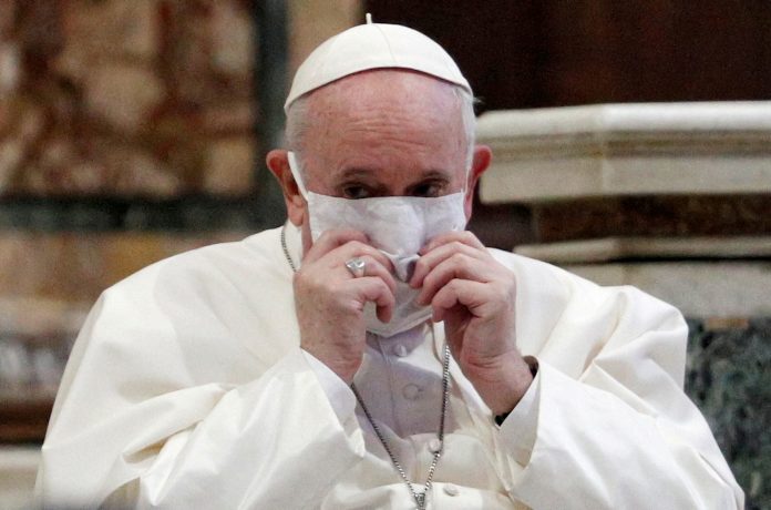 Pope Francis wearing a face mask attends an inter-religious prayer service for peace along with other religious representatives in the Basilica of Santa Maria in Aracoeli, a church on top of Rome's Capitoline Hill, in Rome, Italy, Oct. 20, 2020. (Reuters file photo)
