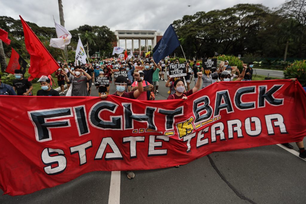 Students, teachers, and activists hold a demonstration inside the University of the Philippines campus in Quezon City on January 19, 2021, to abrogate a deal that bars soldiers and policemen from entering campuses without notifying school officials. (Photo by Jire Carreon for LiCAS.news)