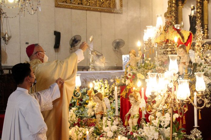 Archbishop Jose Palma celebrates Mass on the Feast of the Sto. Niño at the Basilica Minore del Sto. Niño in Cebu City on Jan. 17, 2021. (Photo by Sammy Navaja/CBCP News)