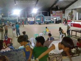 Villagers from Lahug seek temporary shelter at the civic center in Tapaz town, Capiz province, following the killings on Dec. 30. (Photo from CBCP News)