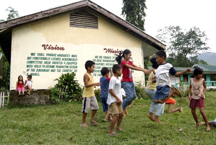Children at play in a school in the southern Philippines. (File photo by Angie de Silva)