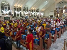 Devotees wear masks and face shields during Mass to celebrate the Feast of the Black nazarene at Quiapo Church in Manila on Jan. 9, 2021. (CBCP News photo)