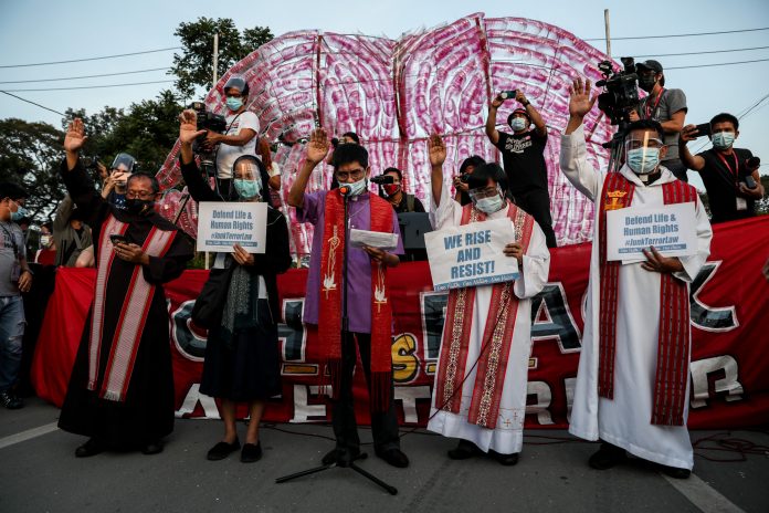 A group of church people join a demonstration in Manila on January 29 to call for the junking of the anti-terror law. (Photo by Basilio Sepe)