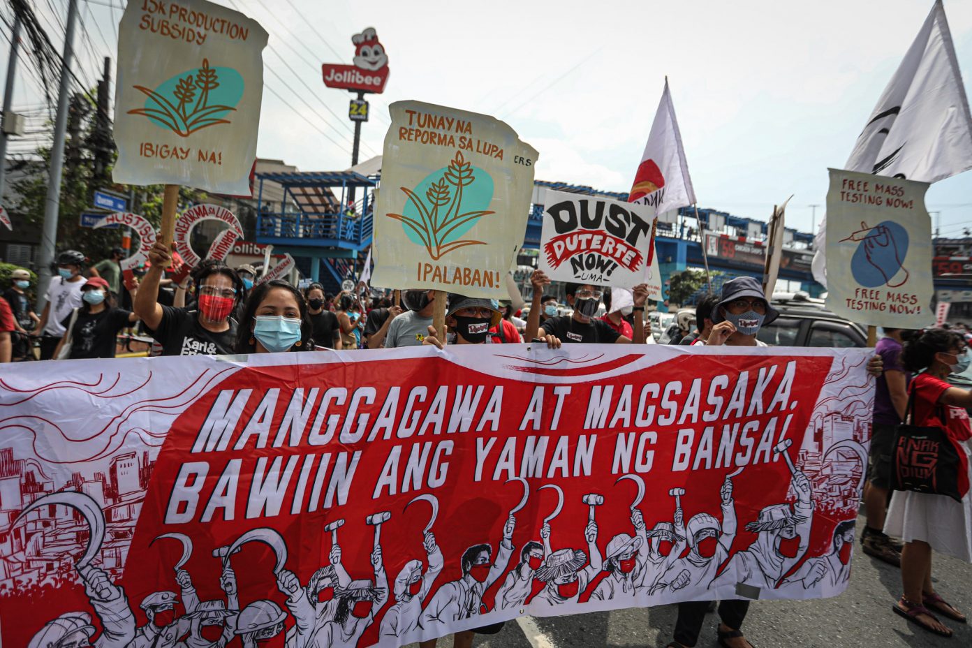 Photos Philippine activists, workers defy authorities, stage Labor Day