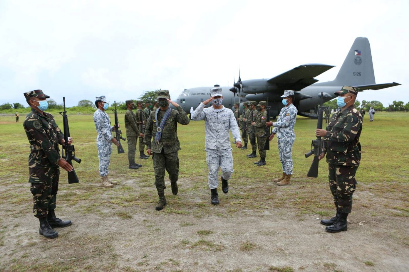 Philippine military chief visits island in disputed waters | Catholic ...