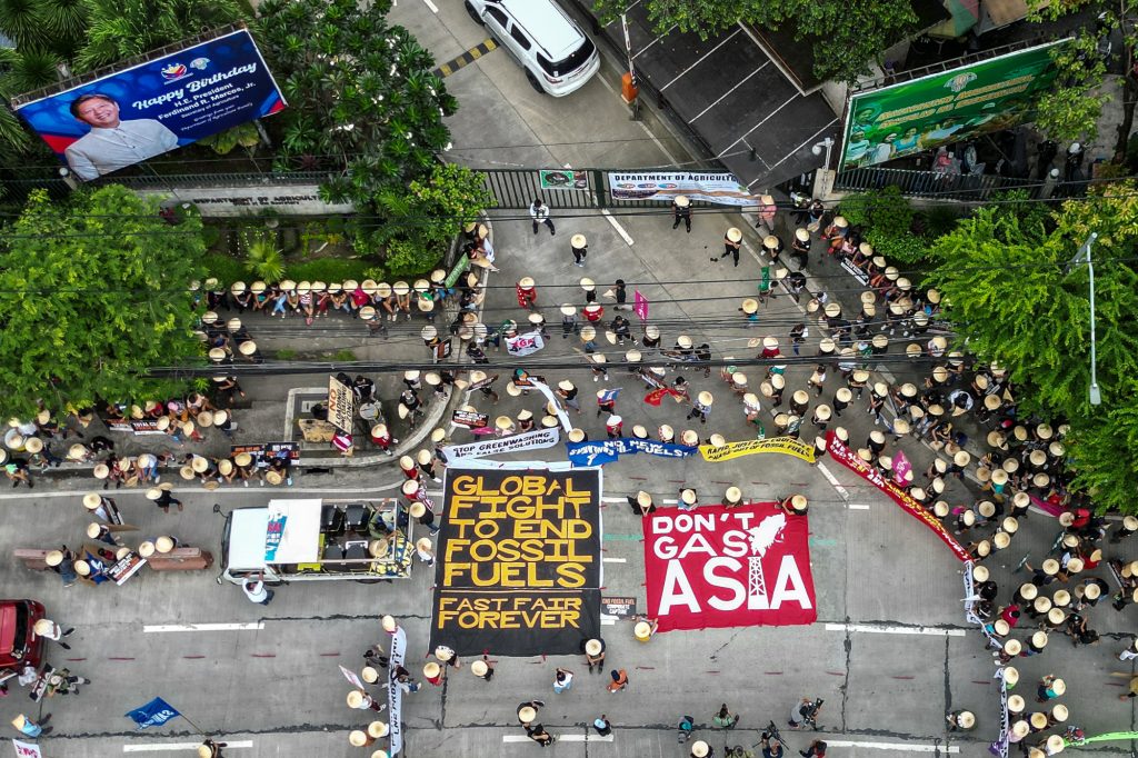 IN PHOTOS Filipino climate activists march against fossil fuel