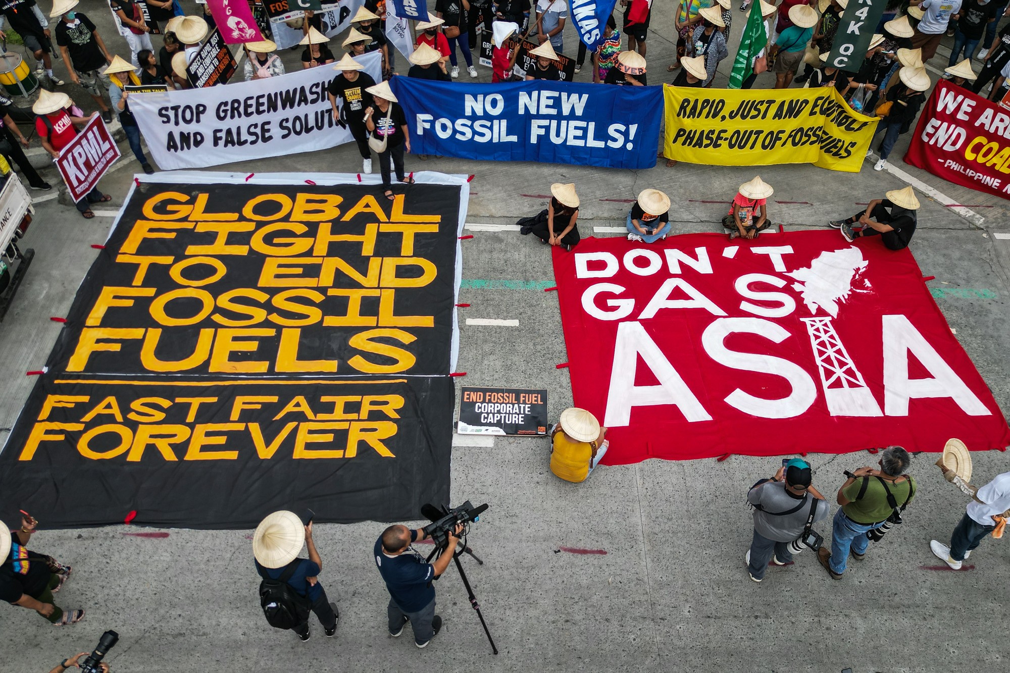 IN PHOTOS Filipino climate activists march against fossil fuel