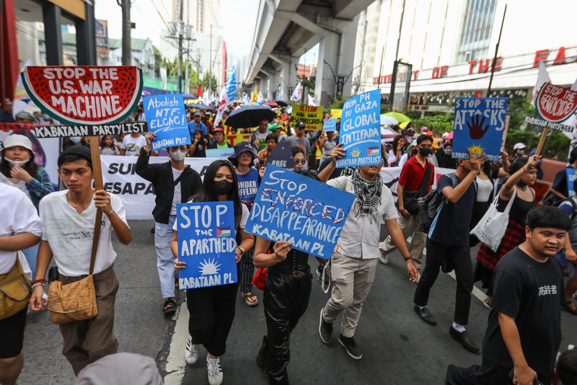 IN PHOTOS: Activists decry government abuses, global injustices on 75th ...