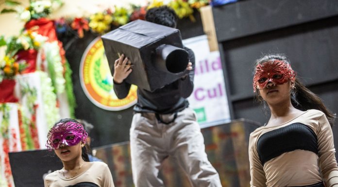 Children acting on stage depicting online sexual exploitation