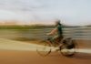 Female cyclist in the Philippines in a blurry photo